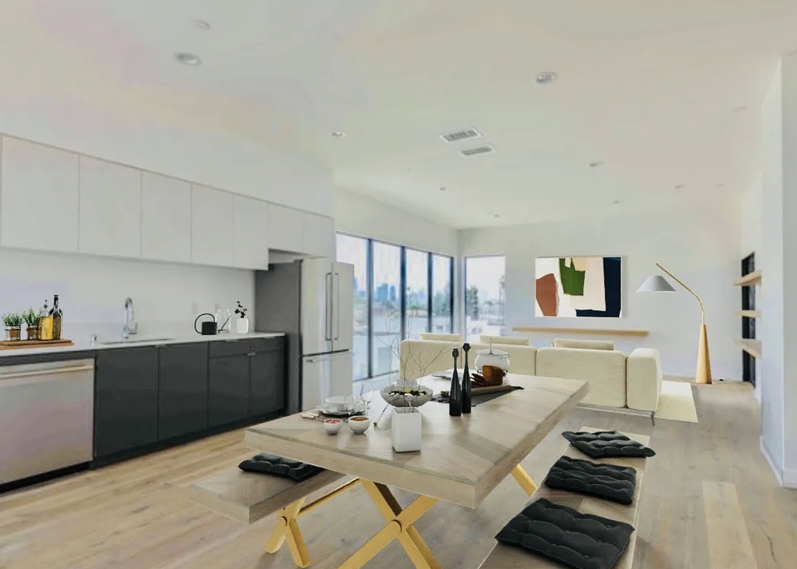 Kitchen and dining area with full-height glazing and city views